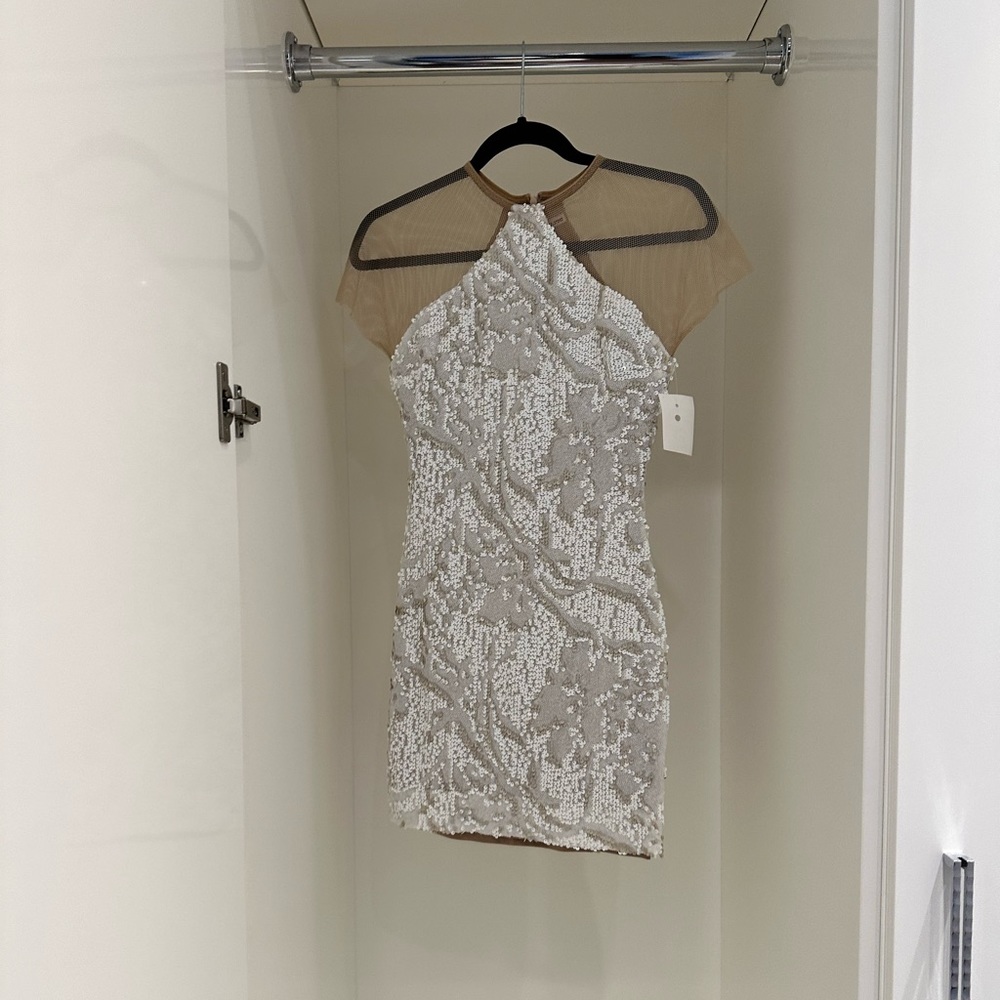 White and nude sequin mini dress.